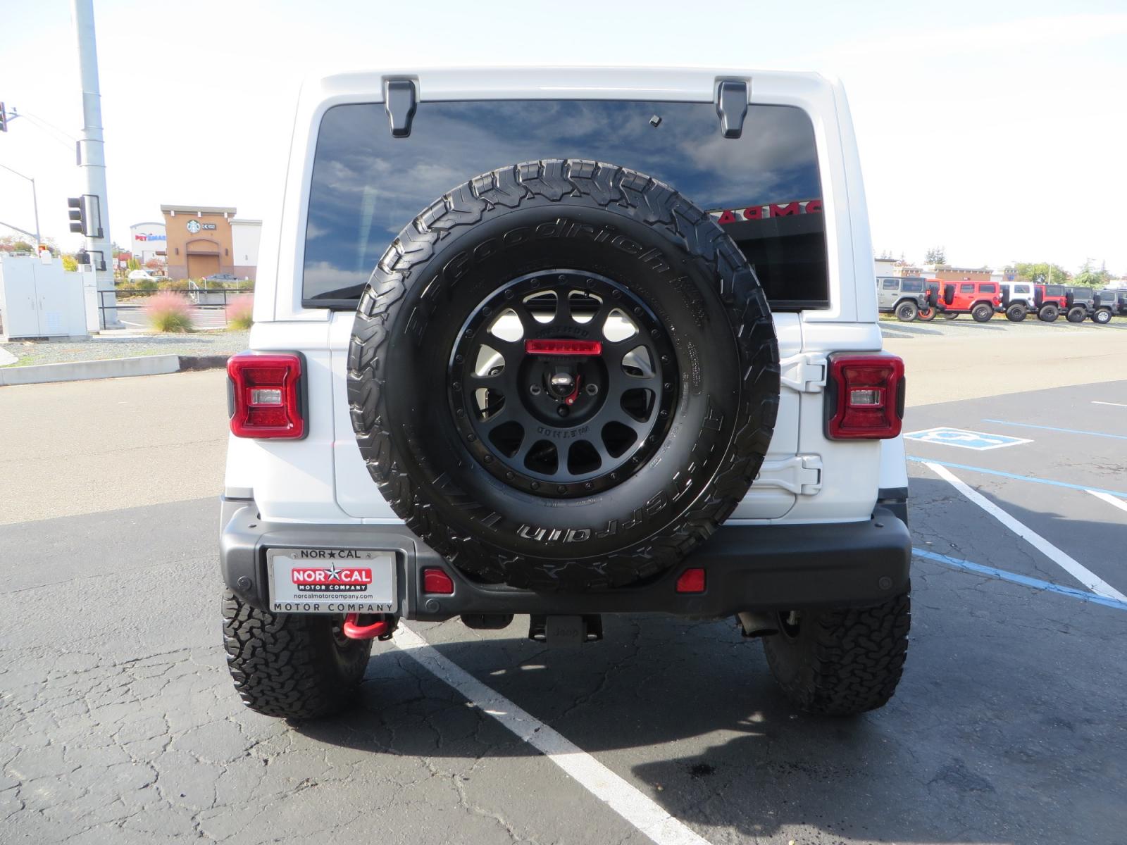 2021 White /BLACK Jeep Wrangler Unlimited Rubicon (1C4HJXFN6MW) with an 2.0L L4 DOHC 16V TURBO engine, automatic transmission, located at 2630 Grass Valley Highway, Auburn, CA, 95603, (530) 508-5100, 38.937893, -121.095482 - Photo #5